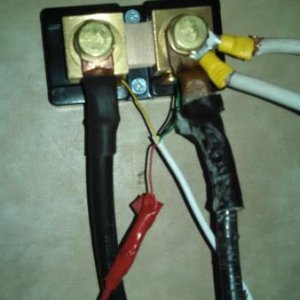 This is a completed wiring install.  The connector on the left runs a single negative 2 AWG wire to the negative post of the battery bank, the post on