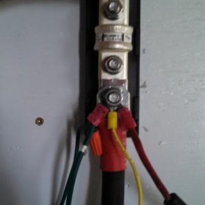 This is the 400 amp in-line fuse without the cover on it.  Notice all of my positive connections that used to be on battery post are now located on th