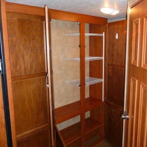 pantry with added shelving installed by previous owner.