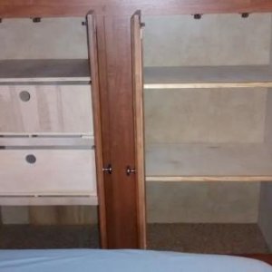 Remodeled bedroom closet.  Replaced closet rods with shelves and drawers. (800x449)