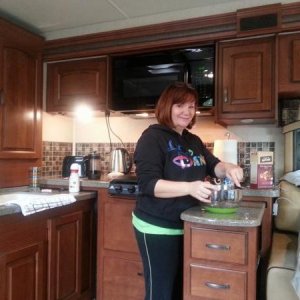 Wendy cooking something delicious in beautiful kitchen