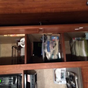 Sideways shot of the pantry closet.  We store about 6-8 bath towels on the bottom shelf, along with face clothes and tea towels.  The $3-5 Walmart bat