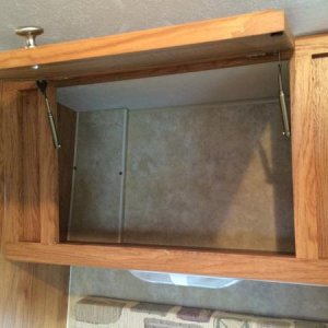 The cabinet above the sink is tapered and a large space leaving dishes stacked and always a mess. So we decided to add a shelf to divide the space.