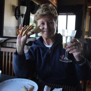 Betty enjoying FRESH Dungenous Crab on our Anniversary in Coos Bay, OR.