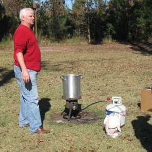 Getting the cooking oil hot to fry the turkey.