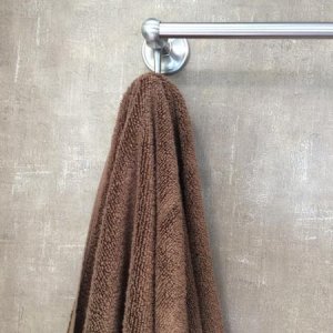 Towel bar also has hooks, comes in handy.