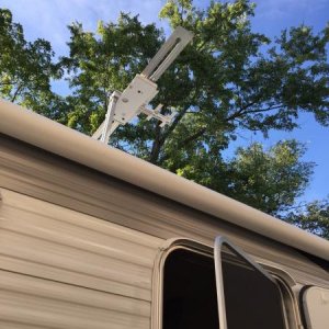 On the roof we mounted the Winegard Wingman and just sitting in our driveway we picked up 8 more tv stations. Not pictured is the MaxxAir 2 vent cover