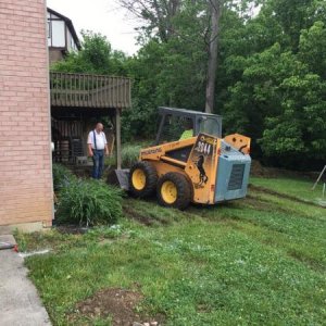 Rented bobcat to dig out the slab.