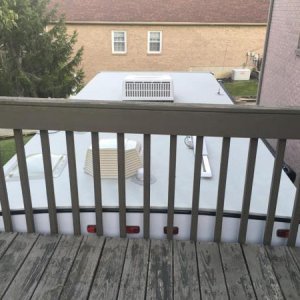 Who needs a ladder to get on the roof of his trailer?  Not this guy.