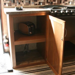 I removed the plywood divider in the lower cupboard to open up the usable space in the lower area.