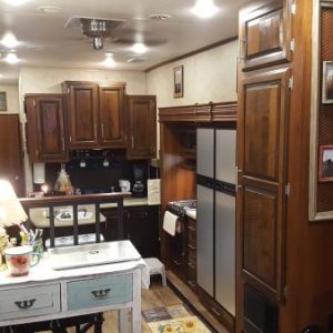 From the upper living room down into the kitchen.