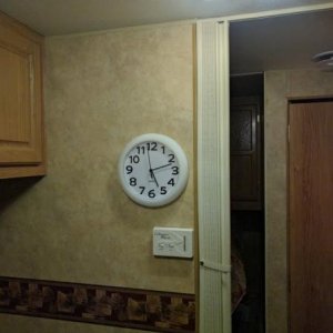 New clock with sweeping second hand, so no ticking in the middle of the night.