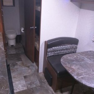 Dinette with stereo and bathroom in back