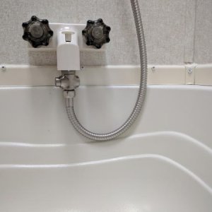 Dura Faucet brushed nickel shower hose.  The hose that comes with the Oxygenics is junk.