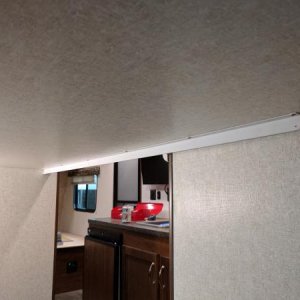 wide view of lower bunk curtain track