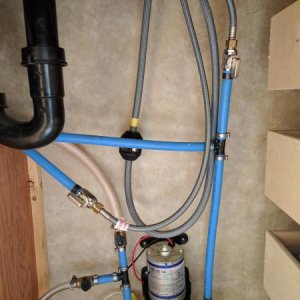 Modified plumbing, changed from 1/2" FIP that connected directly to faucet to 3/8" compression with valves to hookup to faucet.