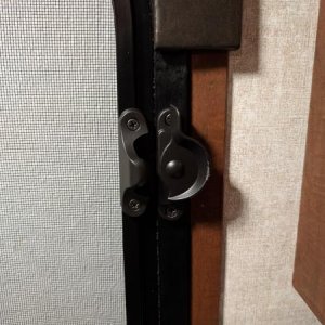 Screen door lock.  This is just a simple and inexpensive window lock for double hung windows.