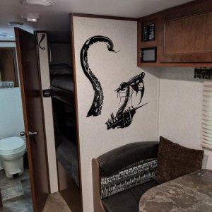 The Kraken wall​ decal: above dinette and thermostat