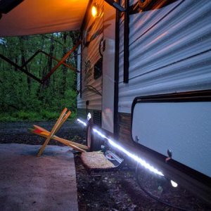 LED under camper lights.  Simple Christmas style lights that are plugged into the outside 120 volt outlet.