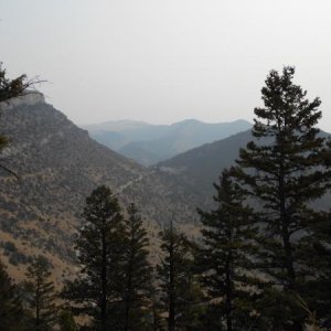 View of the visitor center complex in the distance from entrance to Lewis & Clark Caverns - Lewis & Clark Caverns State Park - southwestern Montana