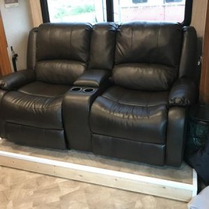 Replaced Dinette With - RecPro Charles 67" Double Recliner Sofa W/Console, Chestnut Color. Added wood around the platform since there was a 4" gap. Ma