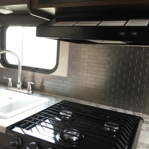 Stainless steel mini-subway tiles. Easy job.