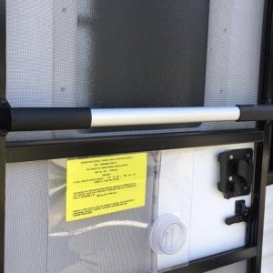 Camco screen door bar.