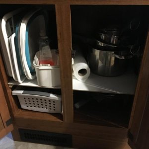 made a shelf under sink