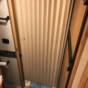 With the Jayco panel in use, there was no way to slide around the bathroom door after showering to finish drying and changing in the back half of the 