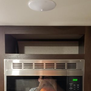 Microwave Shelf - Removed the panel above the microwave to utilize the empty space.  Great place to store bread.