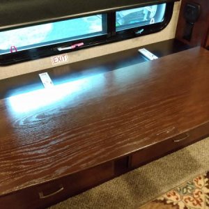 Stained in a dark walnut