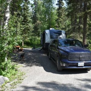 Dry camping.  Sites have plenty of room.  Staff rake the gravel between campers - there was no trash anywhere in the site.  That's Luna posing for the