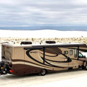 2008 Jayco Seneca 36 MS with scooter on rear hitch.