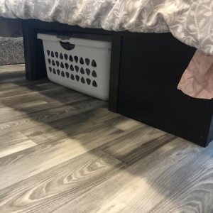 MASTER BEDROOM CUSTOM CLOTHES BASKET RECESS SO DON'T HAVE TO DISTURB PERSON SLEEPING TO ACCESS IT