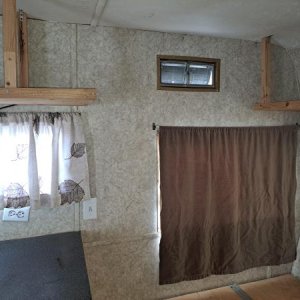 7   area between kitchen and front bed