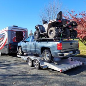 Both atvs on truck deck