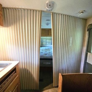 View from Dining Area into Bedroom with slides for privacy