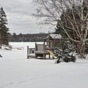 View from parking lot of beach and lake.