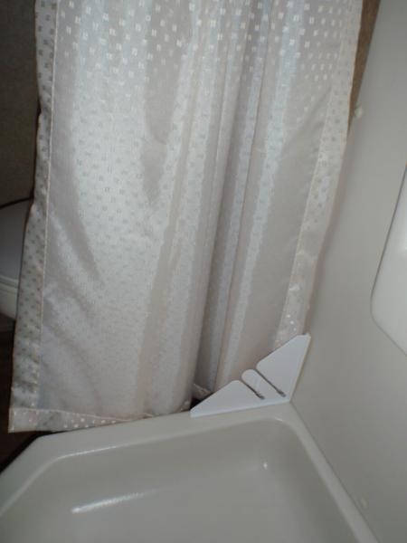 11 Shower - corner water protector.  Try and keep the water "IN" the shower