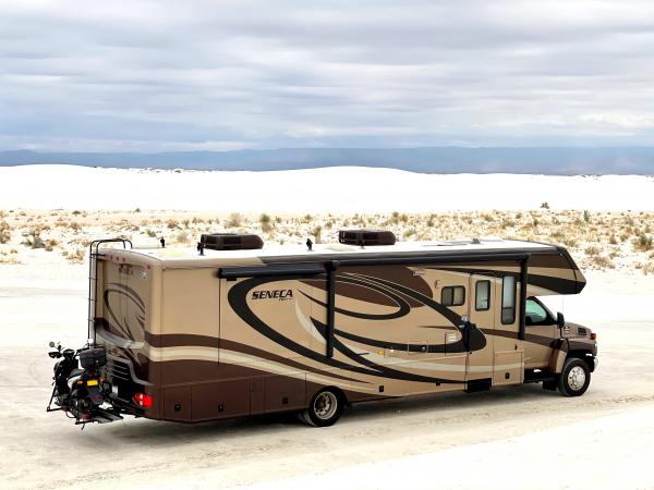 2008 Jayco Seneca 36 MS with scooter on rear hitch.