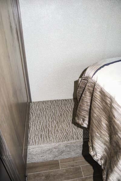 28SS - Bedroom - Step Up - There is a step up next to each side of the bed that is carpeted