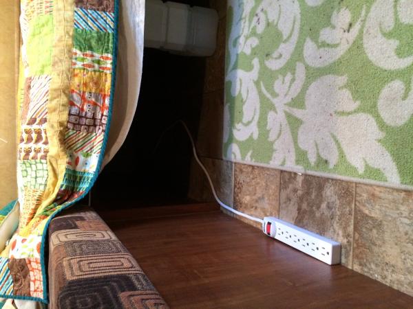 $5 strip outlet extension cord makes charging electronics at bedtime a lot easier!