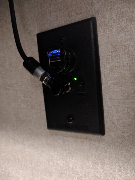 90 degree elbow on TV antenna connection and USB plug in 12 volt outlet.