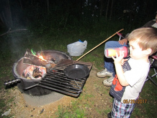 A good campfire with our grandson.