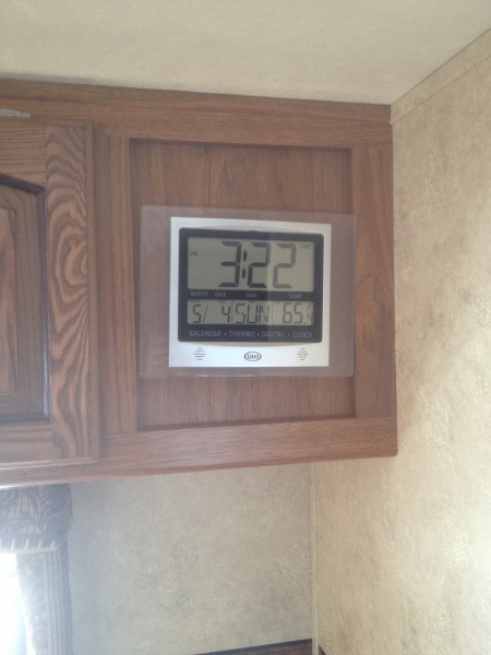 Added a clock with thermometer in an unused dead panel space.