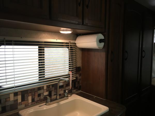 Added a Kamenstein Paper towel holder to the kitchen area.  This will greatly improve that, as we normally kept paper towls in a cupboard, and never h