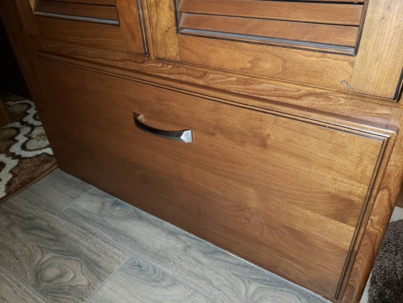 Added drawer below washer/dryer