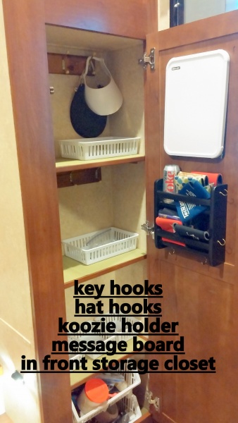 Added hooks for hats and keys, message board, bins for wallets and phones, and a koozie holder to the front closet by the entry door.