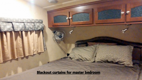 Added thermal blackout curtains to master bedroom