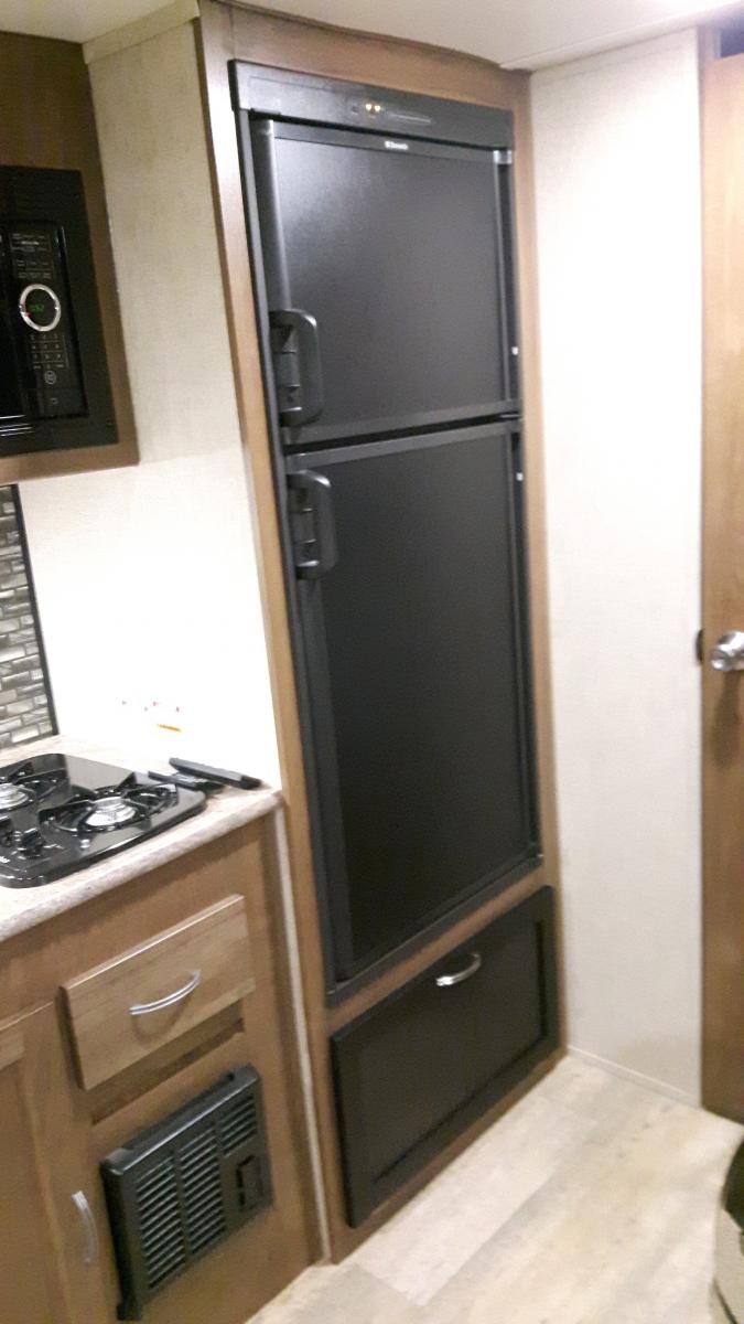 Adding a cabinet door under the fridge